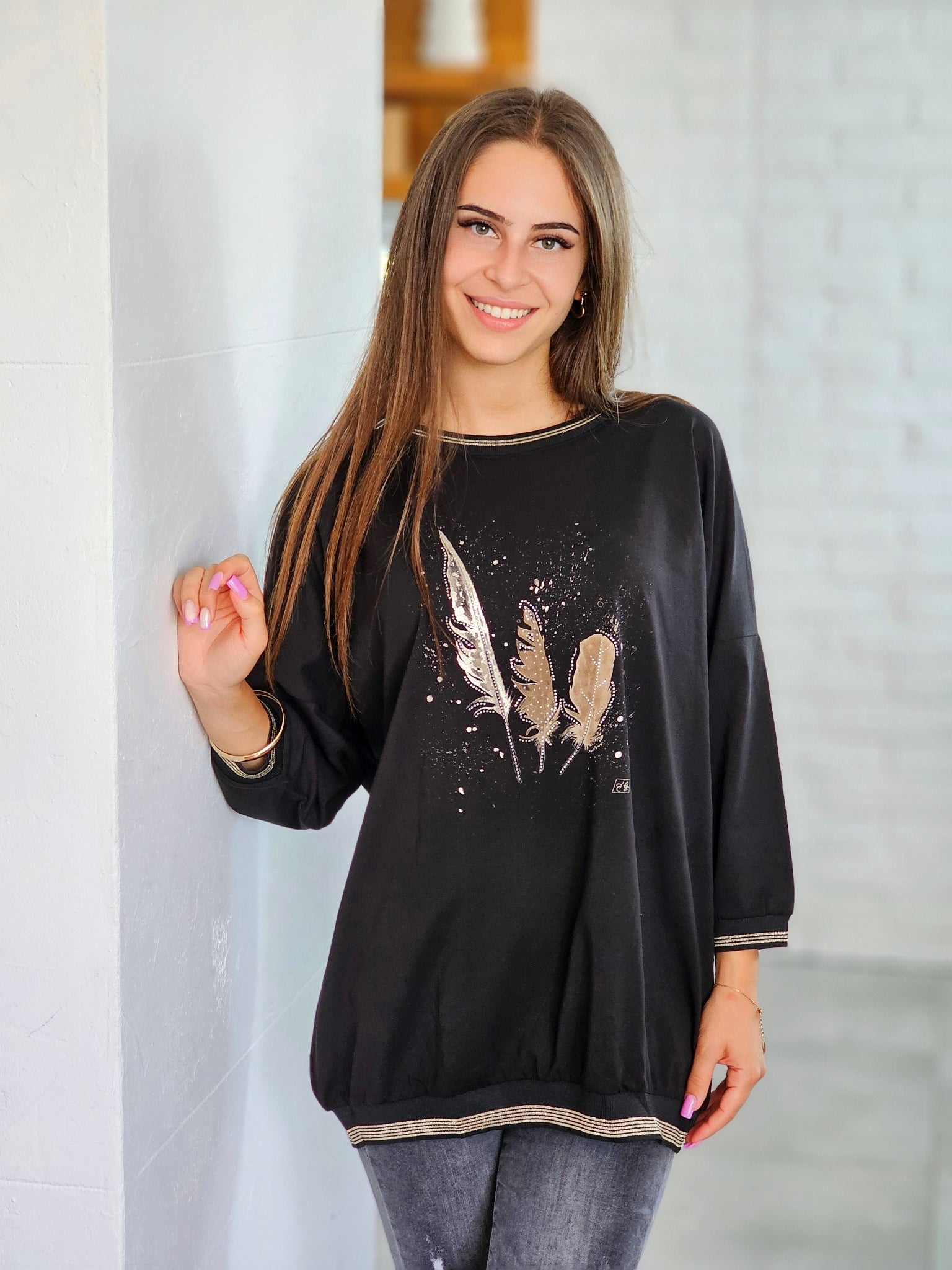 Bluza z piórami – lekkość i styl w jednym